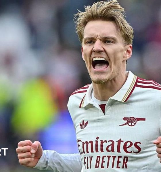 Martin Odegaard celebrates Arsenal's win.