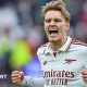 Martin Odegaard celebrates Arsenal's win.