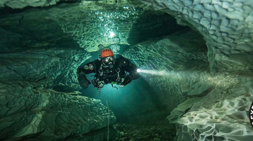 Elite divers begin perilous mission to find Maldives tourists lost in cave amid race to stop sharks scavenging remains