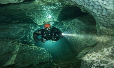 Elite divers begin perilous mission to find Maldives tourists lost in cave amid race to stop sharks scavenging remains