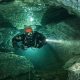 Elite divers begin perilous mission to find Maldives tourists lost in cave amid race to stop sharks scavenging remains