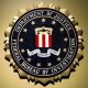 The Federal Bureau of Investigation seal is seen at FBI headquarters before a news conference by FBI Director Christopher Wray on the U.S Justice Department's inspector general's report regarding the actions of the Federal Bureau of Investigation and the