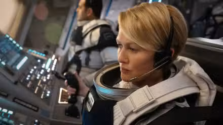 Mireille Enos at the controls of a spacecraft in For All Mankind