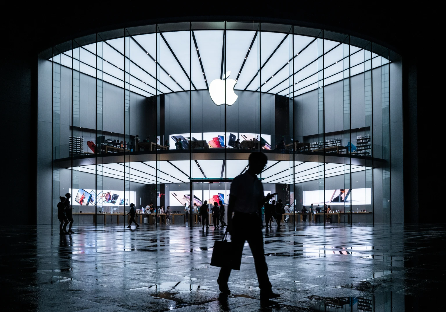 Apple Is Quietly Building The Most Profitable AI Toll Booth