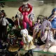 Collection of Various Anime and Manga Figures Displayed in a Glass Shelf