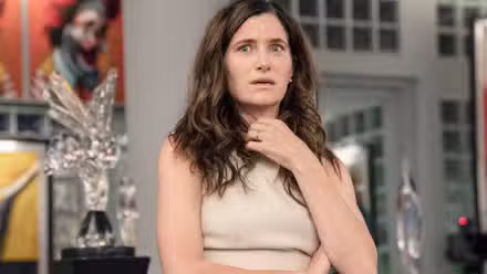 Kathryn Hahn looking surprised in Glass Onion.