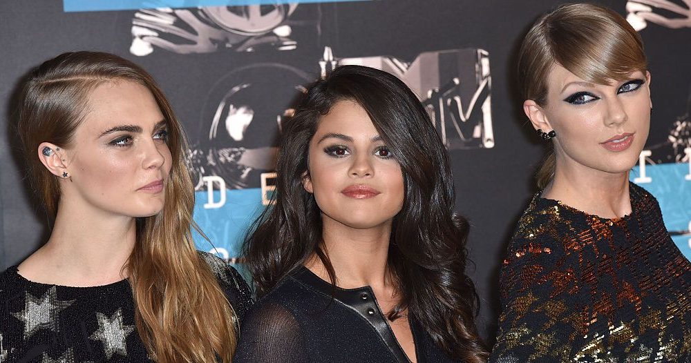 LOS ANGELES, CA - AUGUST 30: (L-R) Model Cara Delevingne, recording artists Selena Gomez and Taylor Swift arrive to the 2015 MTV Video Music Awards at Microsoft Theater on August 30, 2015 in Los Angeles, California.