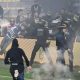 French League match cancelled after fans storm pitch
