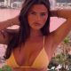 Love Island's Matilda Draper strips off to yellow bikini as fans say she's in her 'single era' after Roman Hackett split