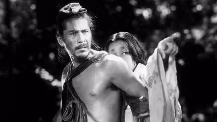 A woman hiding behind a man in Rashomon