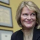Portrait of Senator Cynthia Lummis smiling in her office.