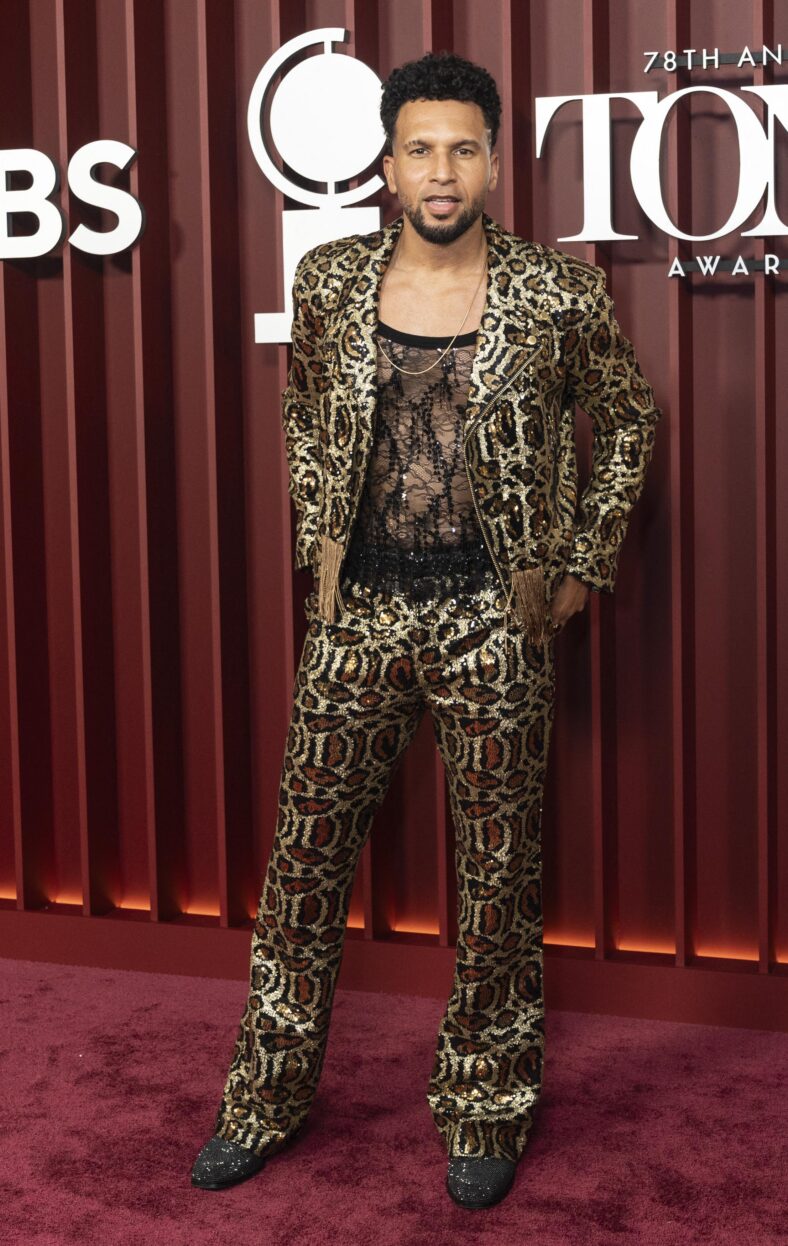 Sydney James Harcourt posing on the red carpet.