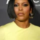Tamron Hall posing on the red carpet.