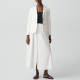 white linen blazer and white skirt