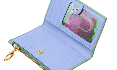 green and lavender card case with pink details