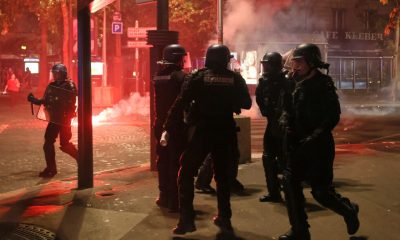 French police detain hundreds in violent clashes after Champions League win