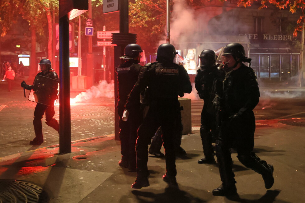 French police detain hundreds in violent clashes after Champions League win