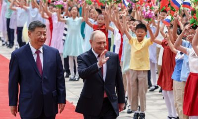Xi and Putin meet in Beijing days after Trump’s visit