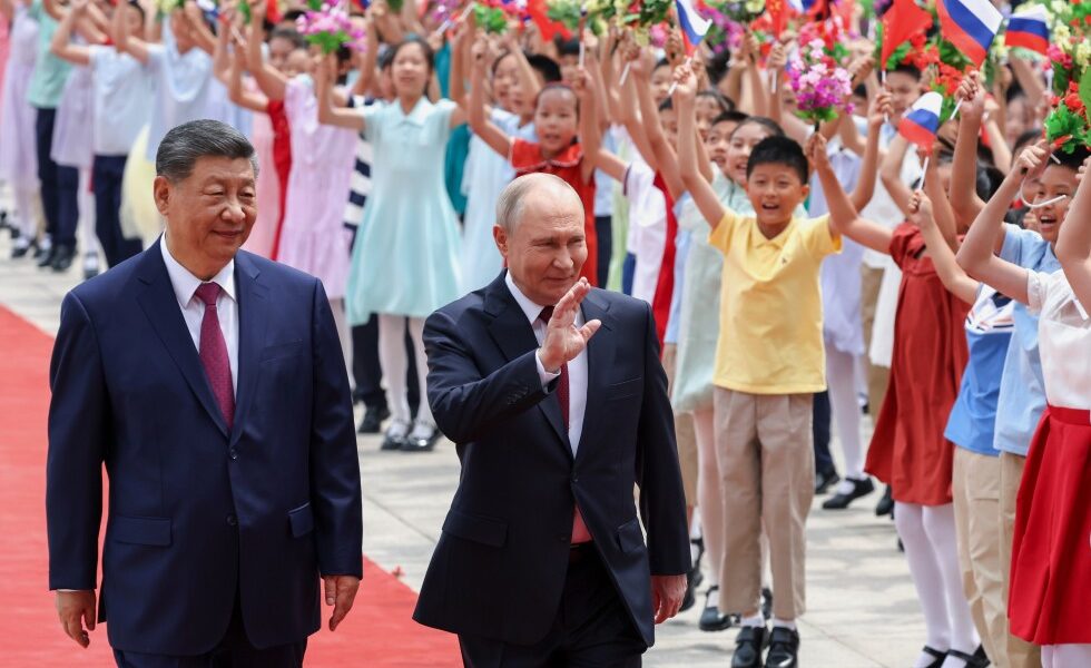 Xi and Putin meet in Beijing days after Trump’s visit