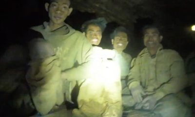 Laos rescuers work to drain flooded cave to free villagers