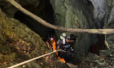 Heavy rains threaten to delay search for 2 people missing in Laos cave