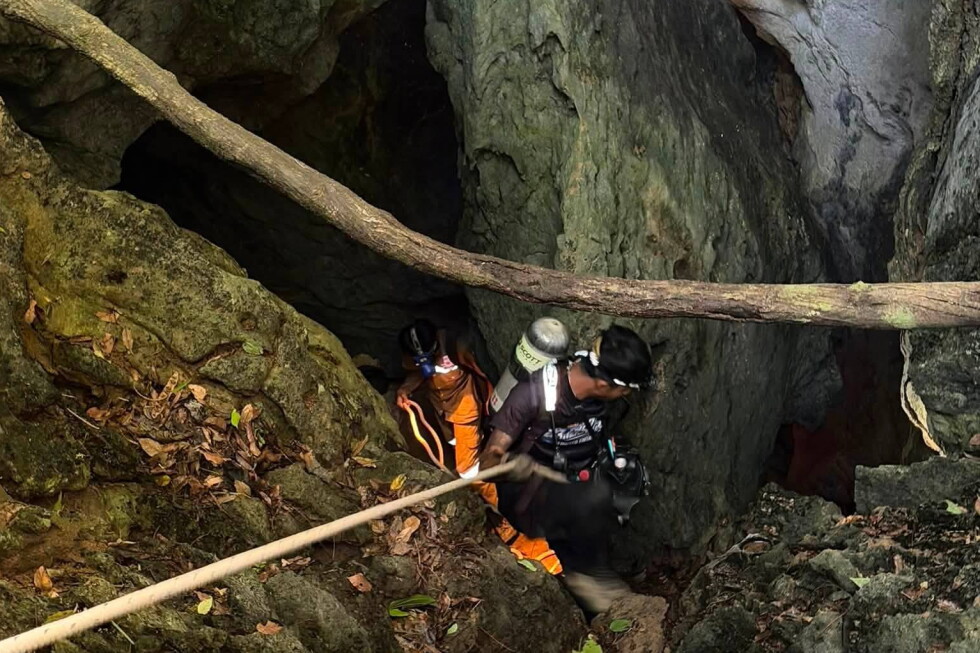 Heavy rains threaten to delay search for 2 people missing in Laos cave