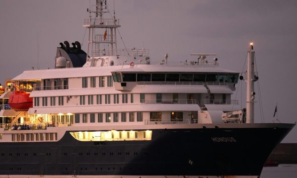 Cruise ship at center of hantavirus outbreak arrives at Spain's Tenerife
