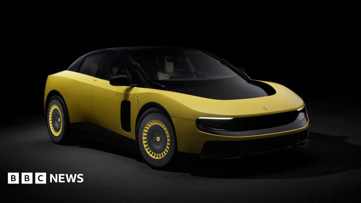 A promotional image of a yellow version of the electric Ferrari Luce, photographed in a dark studio.