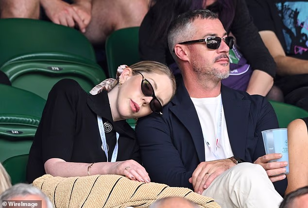 Katherine Ryan fell asleep on her husband Bobby Kootsra's shoulder as they sat centre court at Wimbledon on Tuesday