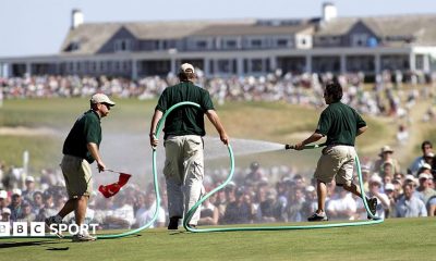 Greenstaff watering the par-three seventh green during the final round of the 2004 US Open at Shinnecock Hills, New York.