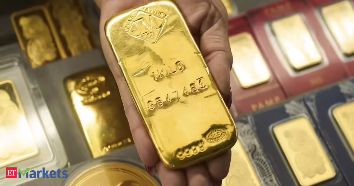 Gold on track for third weekly loss on firm dollar, hawkish Fed signals