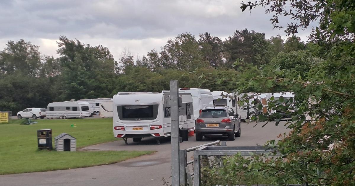 Travellers park up at Howe Bridge Leisure Centre, Atherton