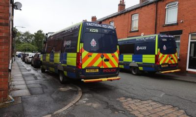 Man arrested in Halliwell as police search property