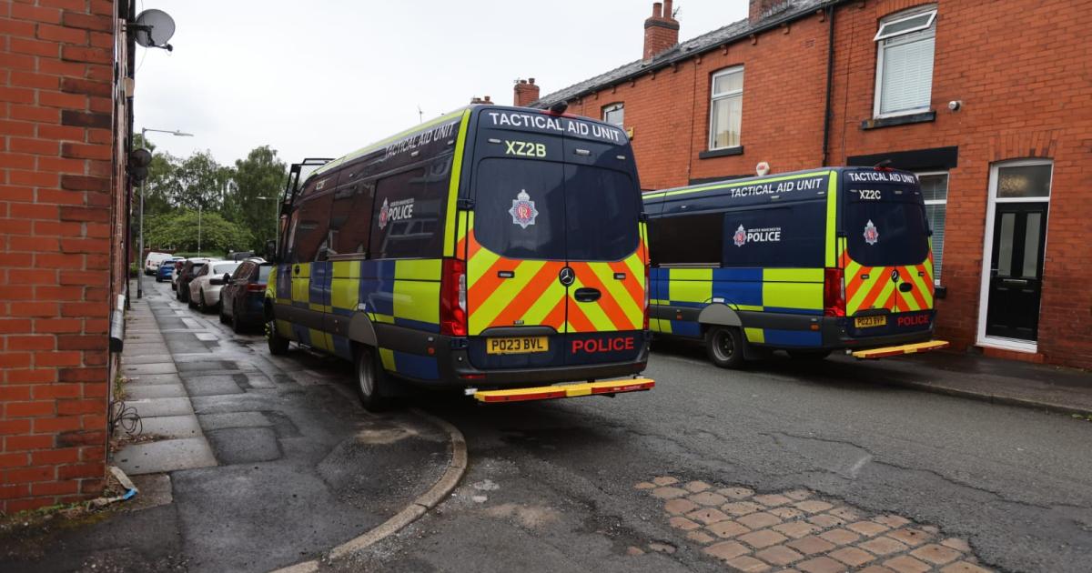 Man arrested in Halliwell as police search property