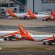 Easyjet planes on the tarmac at Gatwick airport.