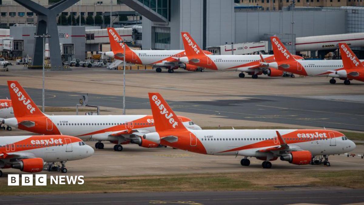 Easyjet planes on the tarmac at Gatwick airport.