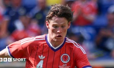 Scott McTominay in action for Scotland in the team's largely red change kit