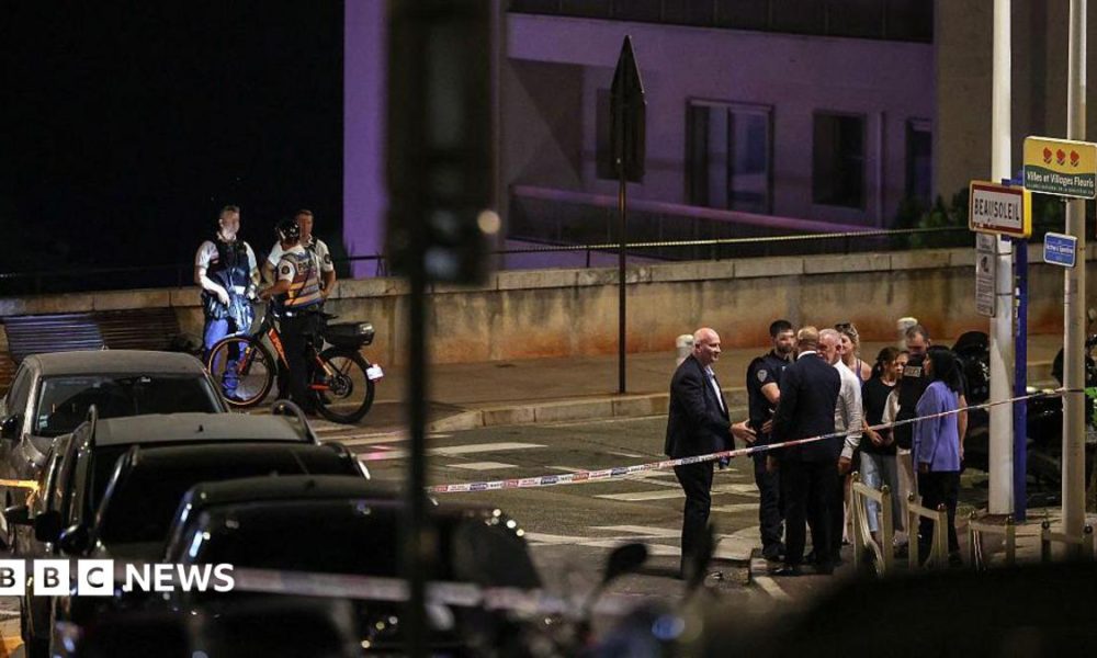 Police near the scene of the blast late at night on a Monaco street