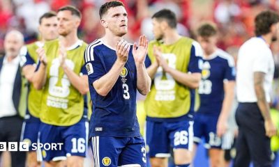 Andy Robertson applauds after Scotland's loss to Morocco