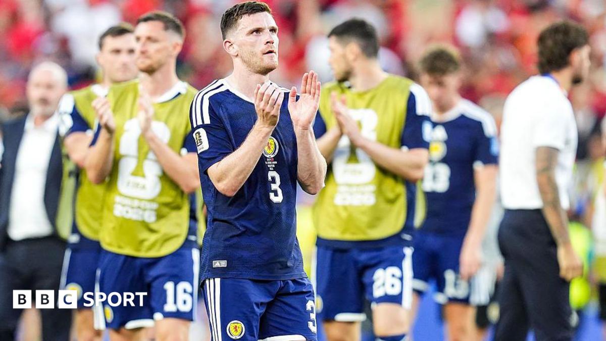 Andy Robertson applauds after Scotland's loss to Morocco