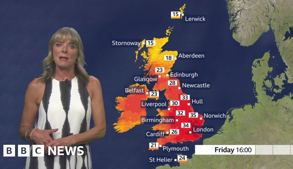 Louise Lear in front of a red UK map