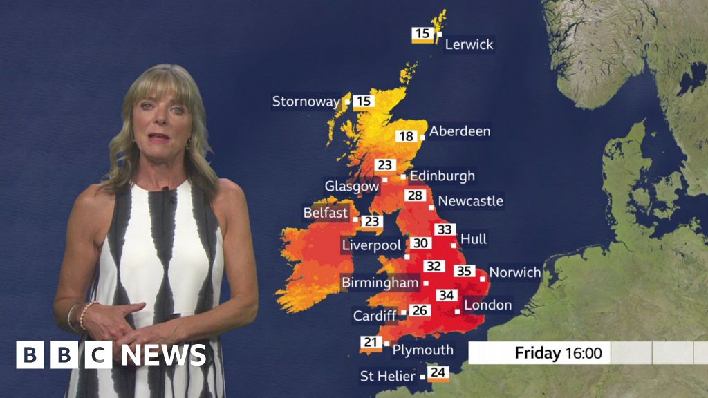 Louise Lear in front of a red UK map