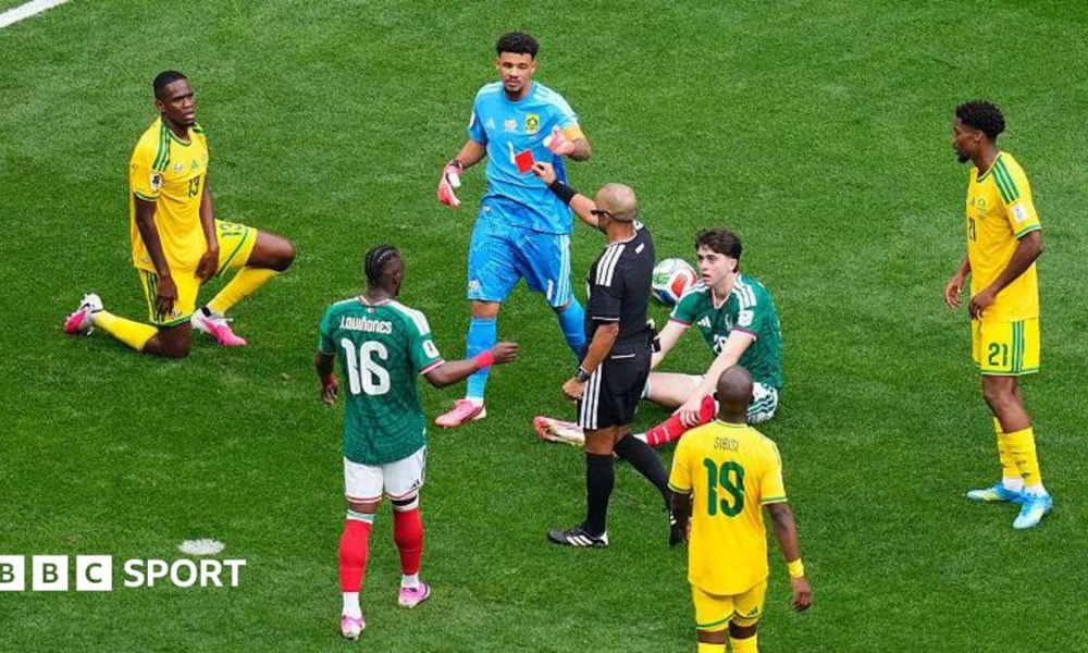 Brian Gutierrez of Mexico is fouled by Sphephelo Sithole of South Africa. Sithole was issued a red card.