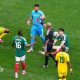 Brian Gutierrez of Mexico is fouled by Sphephelo Sithole of South Africa. Sithole was issued a red card.
