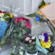 Flowers left at the entrance to a flat.