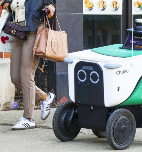 A delivery robot on a sidewalk in Chicago