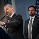 Sherif Soliman (left), director of the Office of Management and Budget, recently briefed Democratic Socialists of America members on city finances.