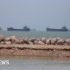 US lifts naval blockade as Iran's supreme leader says Trump made deal 'out of desperation'