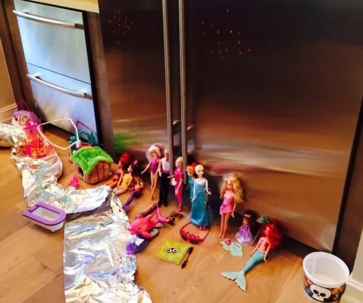 A portion of the author's daughter's doll collection, with aluminum foil "water"