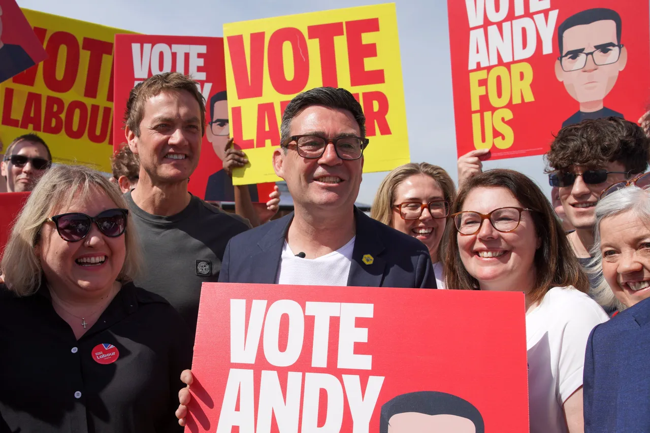 Andy Burnham stands with supporters during the launch of his campaign as Labour's candidate for the Makerfield by-election in Makerfield, England, Friday, May 22, 2026.(AP Photo/Ian Hodgson)